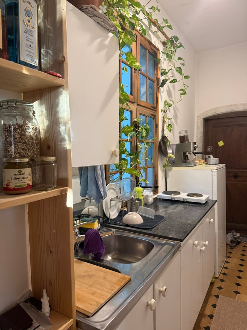 {"type": "Kitchen", "objects": ["sink", "faucet", "cutting board", "fridge", "oven", "cupboard", "fridge", "oven", "faucet", "cupboard", "faucet", "oven", "cupboard", "oven", "cupboard", "oven", "cupboard", "oven", "cupboard", "oven", "cupboard", "oven",
