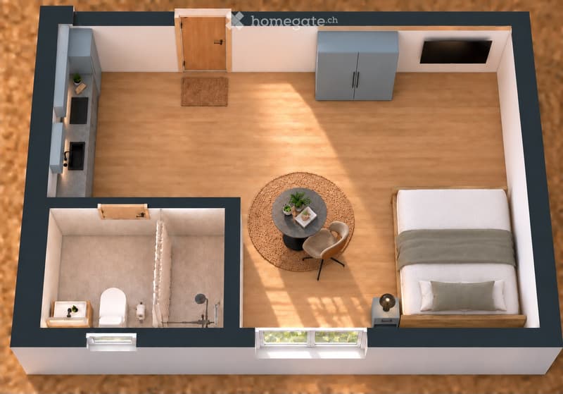 Layout of a compact studio apartment featuring a living area with a bed, round table, and chair, a small kitchen area, and a separate bathroom.