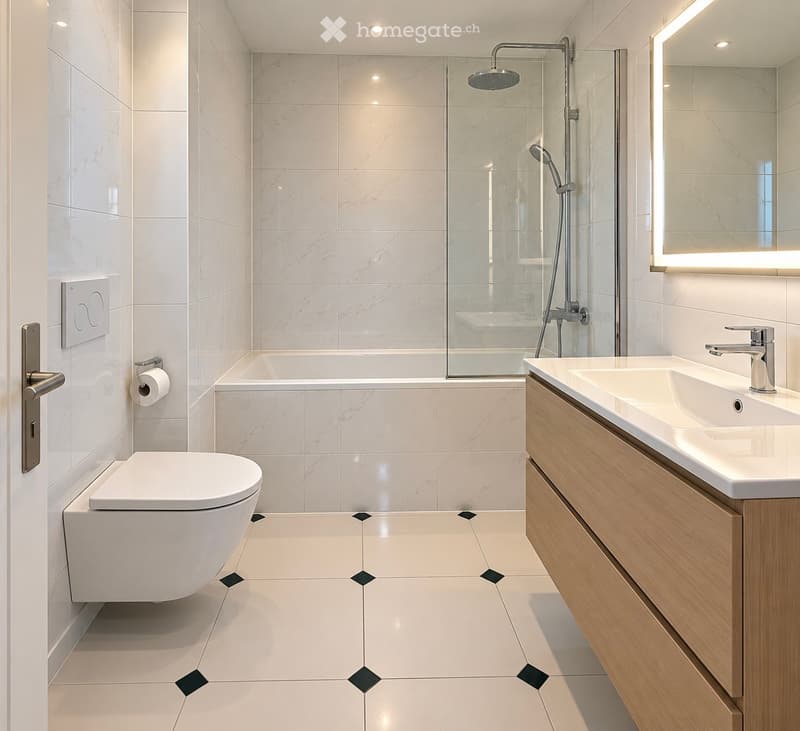 Modern bathroom with white marble tiles, a toilet, a sink with wooden cabinet, a bathtub with glass shower enclosure, and a large illuminated mirror.