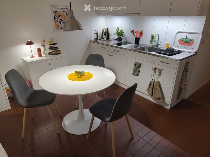 {"type": "Kitchen", "objects": ["table", "chair", "sink", "faucet", "cupboard", "bottle", "faucet", "dish rack", "lamp", "vase", "plant", "cup", "cupboard", "faucet", "faucet", "cupboard", "cupboard", "cupboard", "cupboard", "cupboard", "cupboard", "cupbo