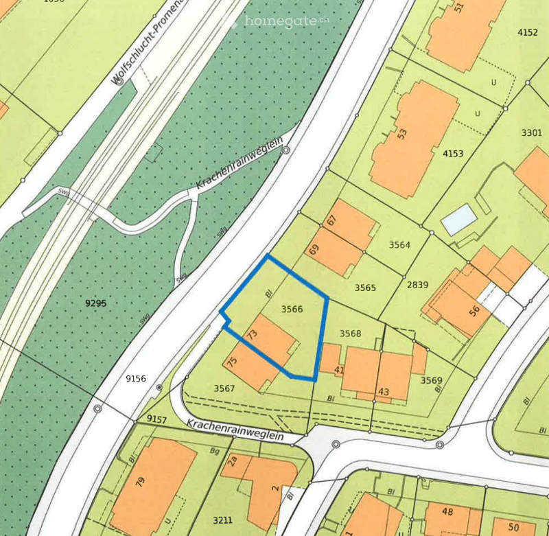 Floor plan showing multiple plots and buildings, with numbered sections and labeled streets.