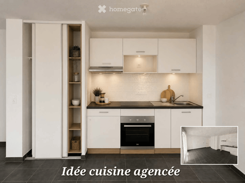 Modern, fully equipped kitchen with white cabinets, stainless steel appliances, and black tiled flooring. Features include an oven, sink, faucet, coffee maker, and decorative potted plants.