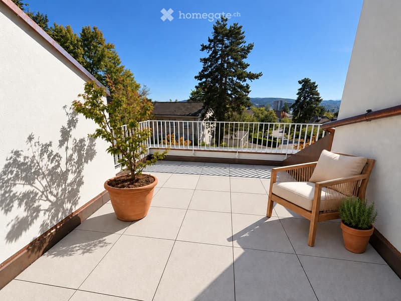 Balcony with tiled floor, white railing, wooden chair with white cushion, and potted plants.
