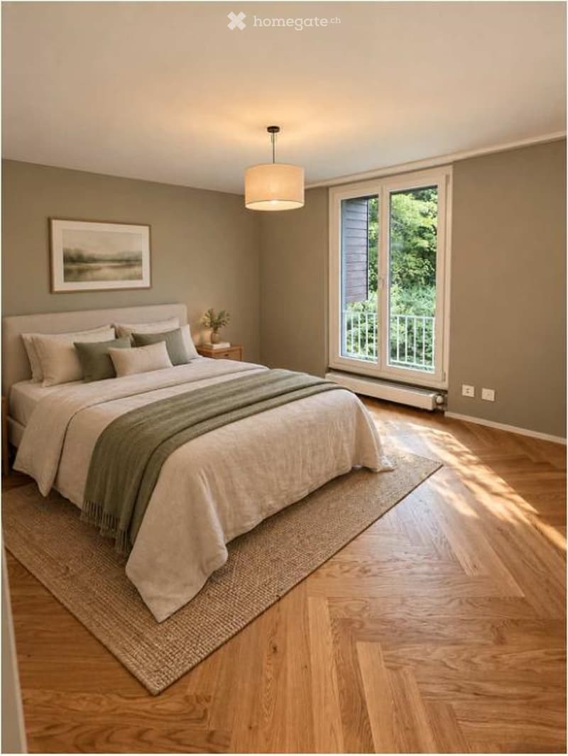 Cozy bedroom with a large bed, nightstand, picture frame, floor lamp, and a rug. Large windows with a view of greenery and access to a balcony.