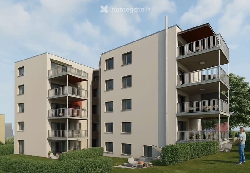 Modern multi-story apartment building with balconies, large windows, and a landscaped lawn area.
