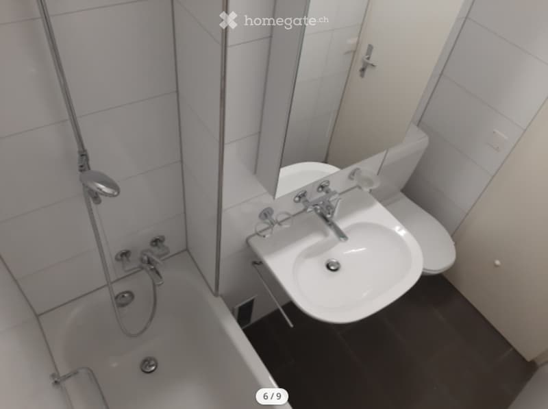 modern bathroom with shower, bathtub, sink, toilet, mirror