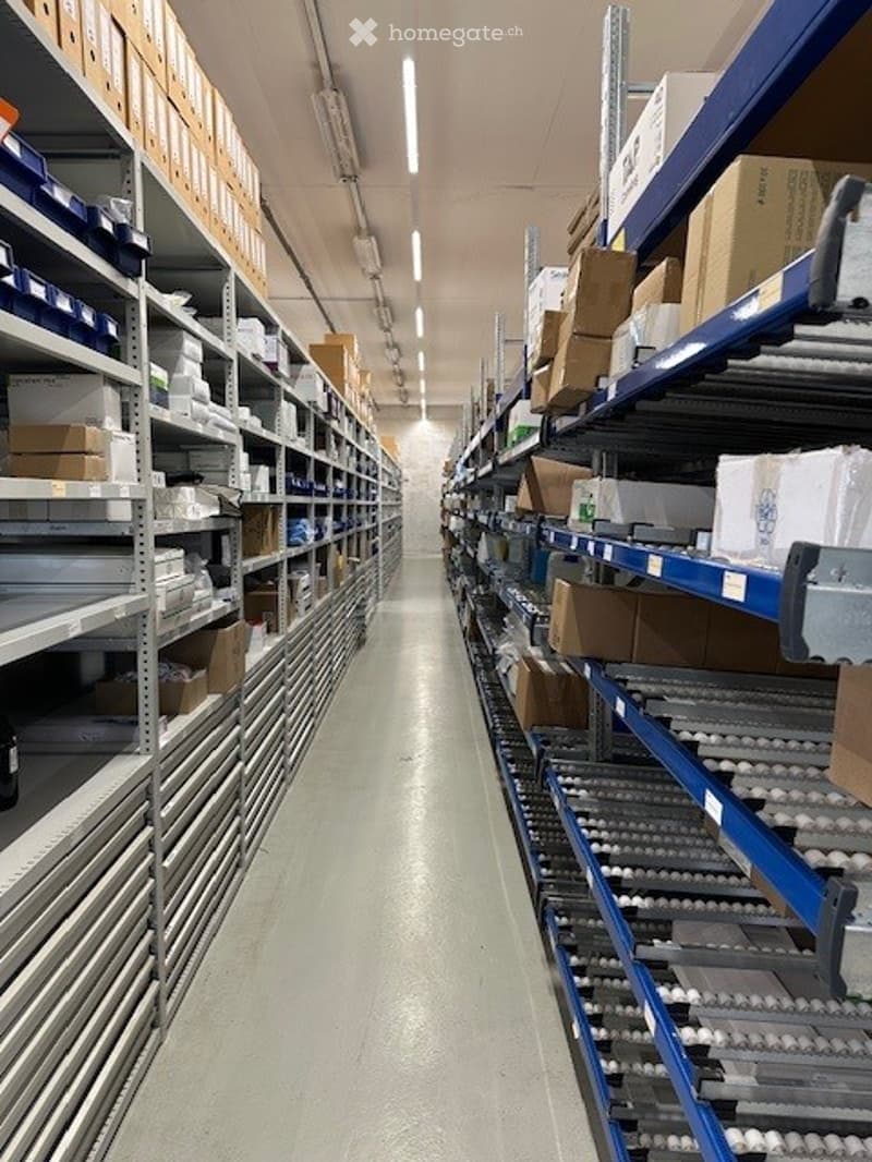 empty warehouse with many shelves and boxes, metal structures, metal rack
