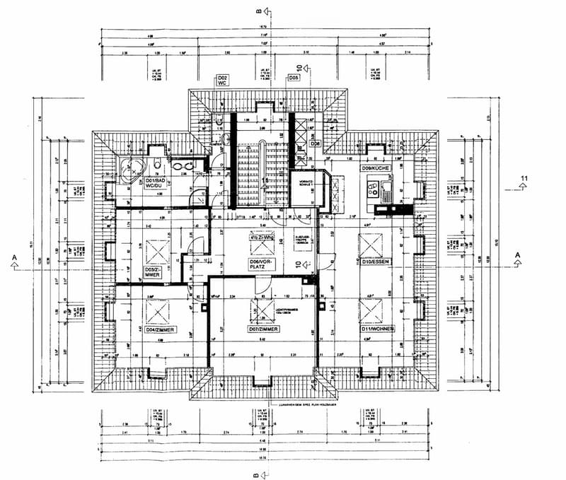 Floor plan of a multi-story building with labeled rooms including living room, kitchen, bedrooms, bathrooms, and other spaces.
