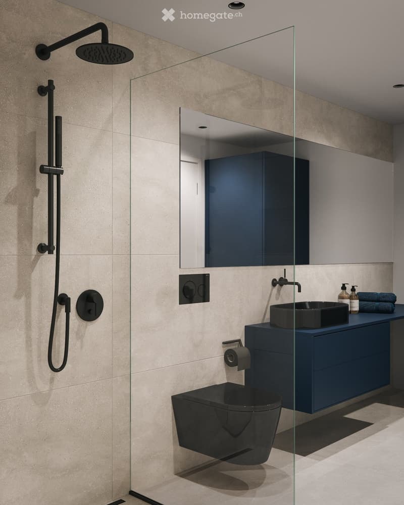 Modern bathroom with glass shower enclosure, black shower head, blue cabinets, black toilet, black sink, and a mirror.