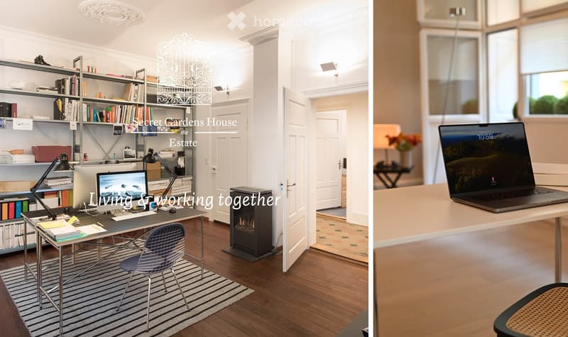 A well-furnished room with a desk, laptop, bookshelf, and fireplace. The room features wooden flooring, a striped rug, and a cozy, organized workspace.