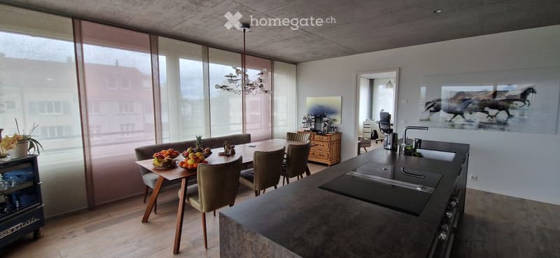 {"type": "Furnished Room", "objects": ["dining table", "chairs", "kitchen island", "sink", "faucet", "fridge", "chair", "desk", "chair", "fridge", "fridge", "fridge", "fridge", "fridge", "fridge", "fridge", "fridge", "fridge", "fridge", "fridge", "fridge"
