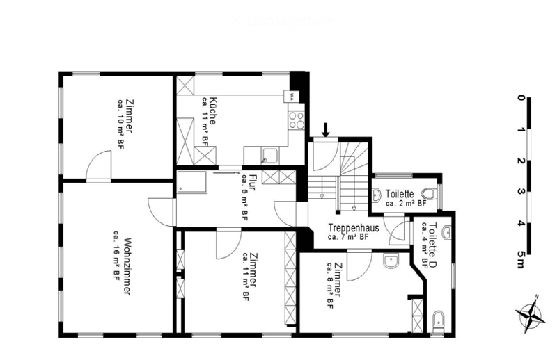 Floor plan of a 2-bedroom apartment with kitchen, living room, staircase, and two bathrooms.
