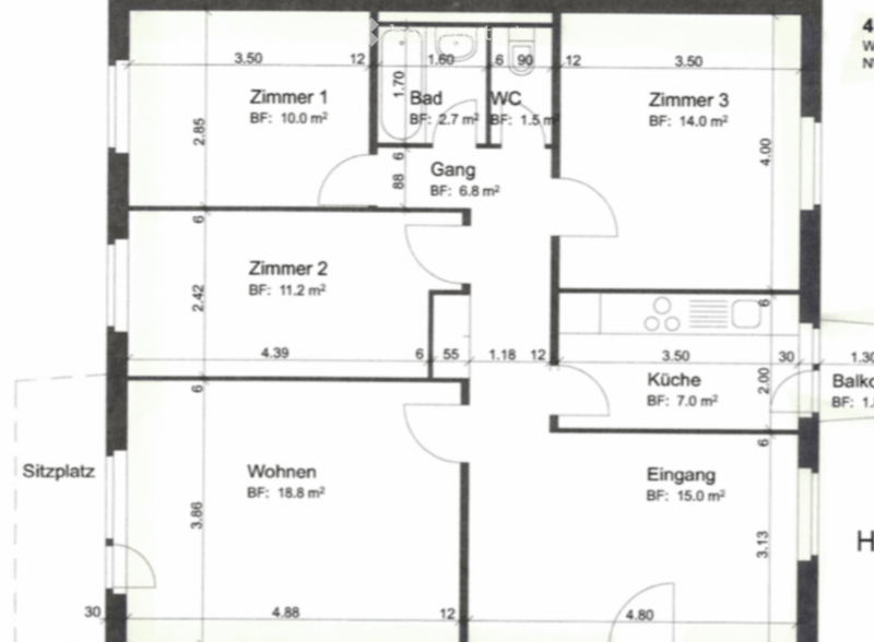 Floor plan showing a layout with four bedrooms, a bathroom, a kitchen, a living area, a hallway, and a balcony.