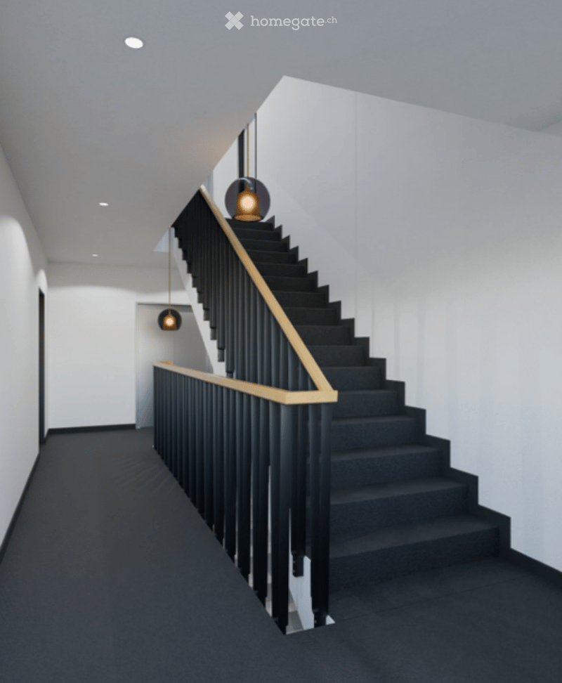 modern staircase with black steps and wooden railing, two yellow lamps