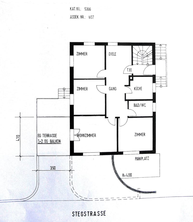 Floor plan showing a layout with multiple rooms including a living room, kitchen, bathrooms, bedrooms, hallway, and a parking space. Includes a terrace and balcony.