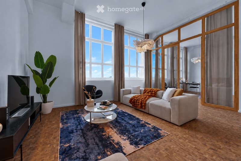 Modern living room with large windows, wooden flooring, a sofa with throw blankets, a coffee table, a TV, and a potted plant.