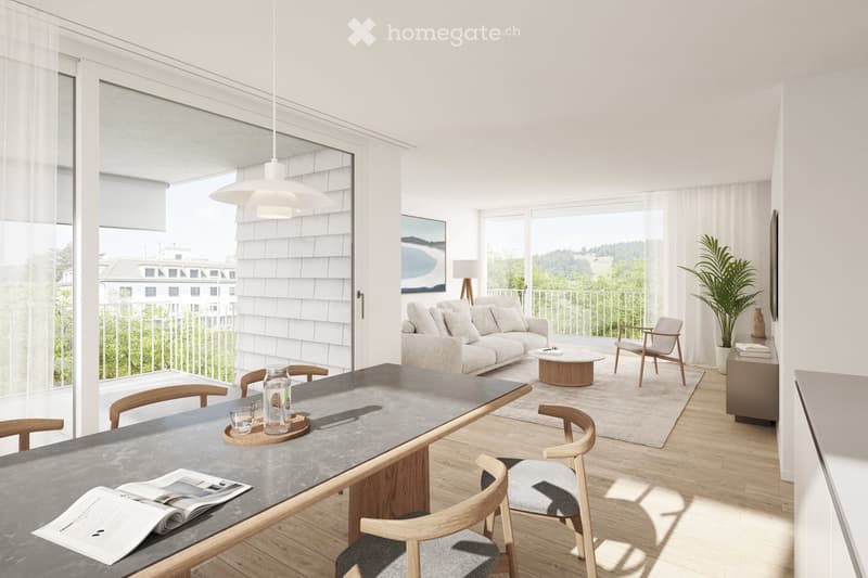 Modern living and dining area with a grey sofa, coffee table, dining table with chairs, potted plant, and artwork on the wall. Large windows and a balcony are visible.