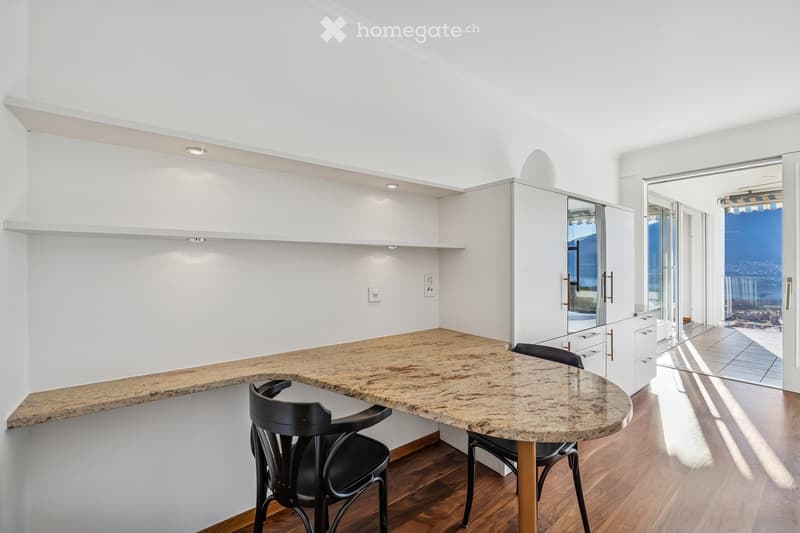 Desk with chairs, modern style, wooden floor, marble desk, shelves, power outlets, glass door to balcony
