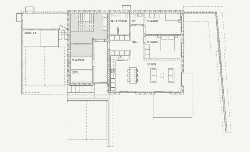 Floor plan of a house with multiple rooms including a living room, dining room, bedrooms, bathroom, hallway, and additional spaces such as a storage area and a cave.