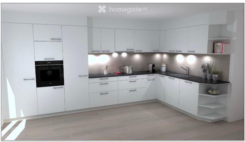 Modern white kitchen with sleek cabinets, an oven, a sink, and various small appliances and decorative items on the counter.