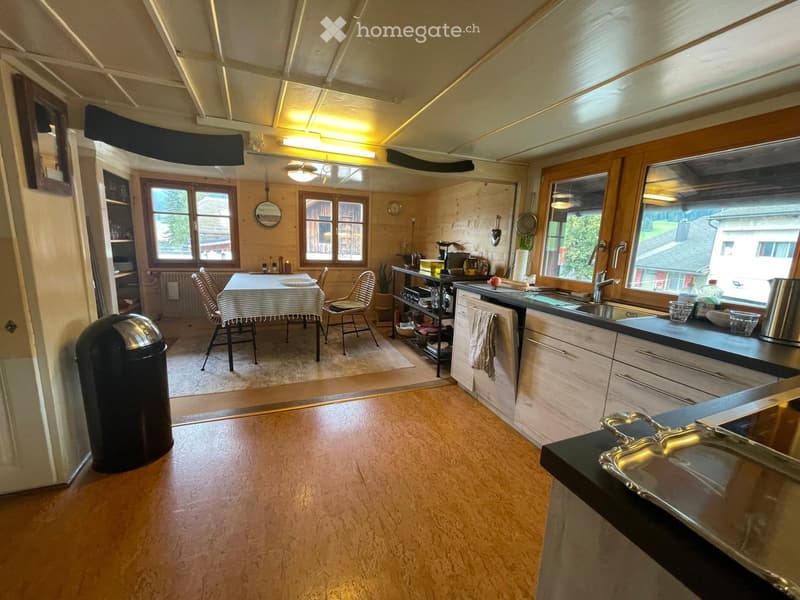 {"type": "Kitchen", "objects": ["sink", "faucet", "countertop", "chair", "table", "tablecloth", "fridge", "cupboard", "faucet", "faucet", "faucet", "faucet", "faucet", "faucet", "faucet", "faucet", "faucet", "faucet", "faucet", "faucet", "faucet", "faucet