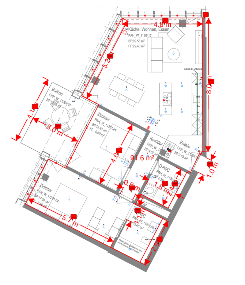 Floor plan of an apartment with a living room, kitchen, two bedrooms, two bathrooms, and a balcony.