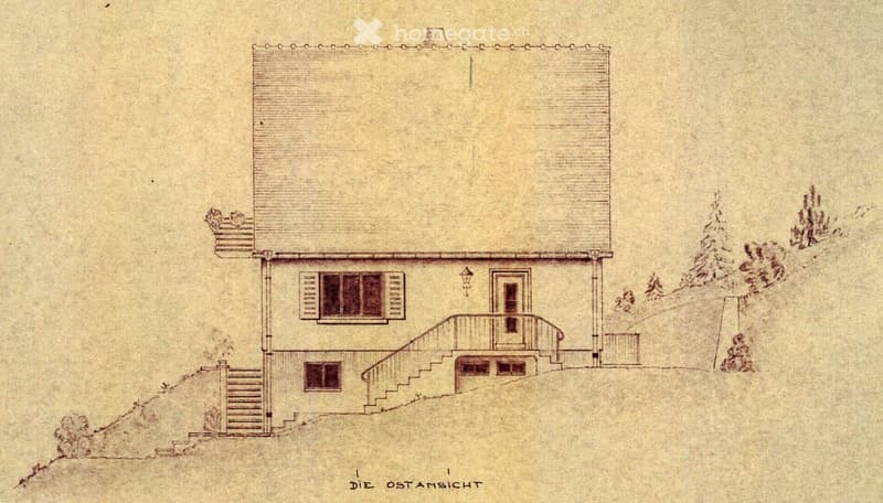 Architectural drawing of a two-story house with a raised ground floor, featuring a staircase leading to the entrance, multiple windows, and a chimney. The house is surrounded by small trees and shrubs.