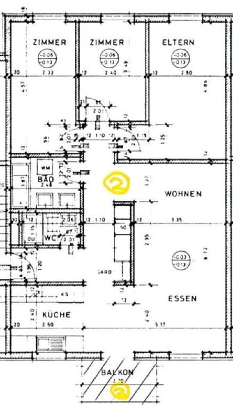 Floor plan of a house with multiple rooms including a kitchen, living area, bedrooms, and a balcony.