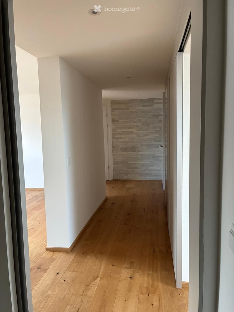 wooden floor, white walls, hallway