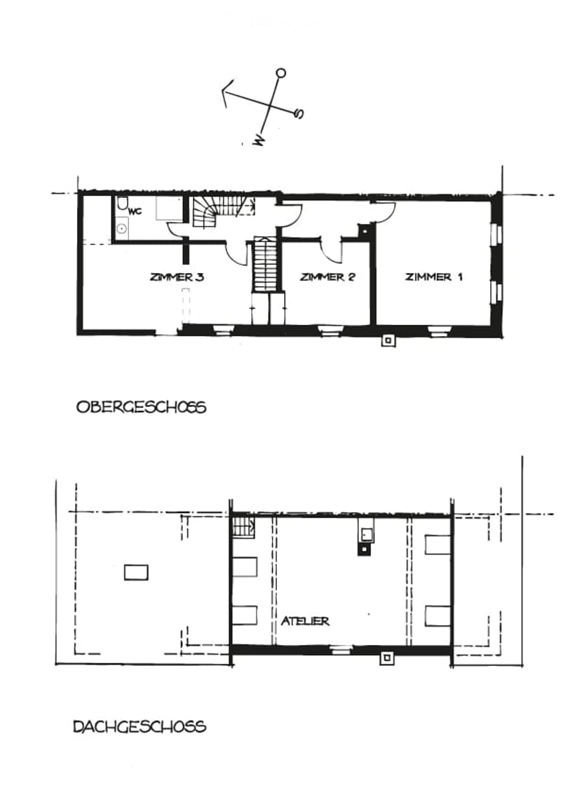 Floor plan of a two-story building with three rooms on the upper level and an atelier on the lower level. The upper level includes a WC, three bedrooms, and a staircase. The lower level features an atelier space.