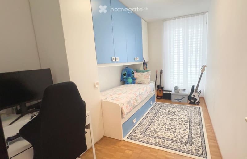 {"type": "Furnished Room", "objects": ["chair", "screen", "guitar", "guitar", "guitar", "guitar", "guitar", "guitar", "guitar", "guitar", "guitar", "guitar", "guitar", "guitar", "guitar", "guitar", "guitar", "guitar", "guitar", "guitar", "guitar", "guitar
