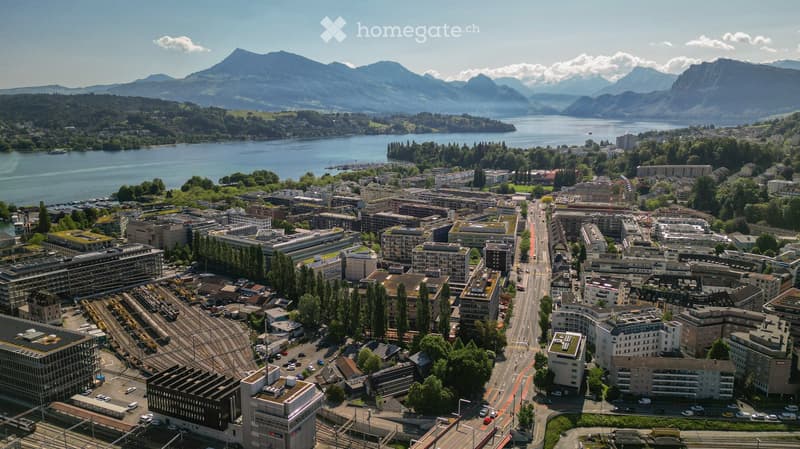 Cityscape of Lucerne, Switzerland with Alps mountains, Lake Lucerne, buildings, greenery