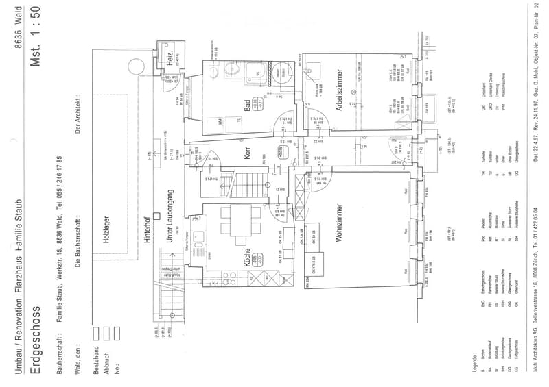 Floor plan of a residential building showing multiple rooms including kitchen, living room, bedrooms, bathroom, hallway, and utility areas. The layout includes dimensions and room labels.