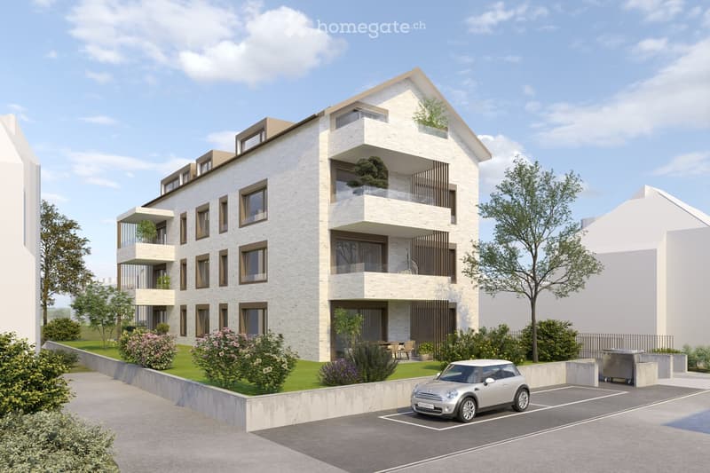 3 story building, white exterior, multiple balconies, grass lawn, parking lot