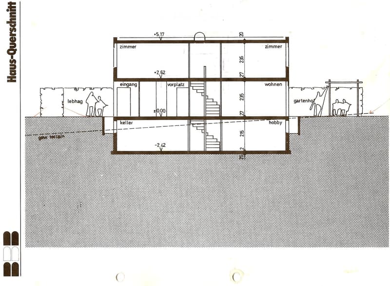 Floor plan of a house showing multiple rooms including living area, bedrooms, entrance, hallway, cellar, and hobby room. Stairs connect different levels.