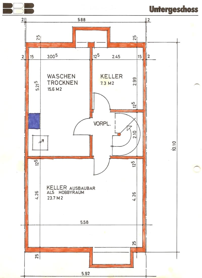 Floor plan of the basement level showing a laundry area, storage room, hobby room, and entrance area with dimensions.