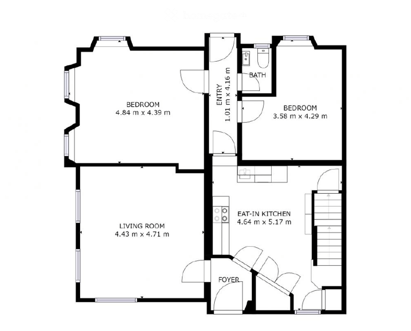 Floor plan of a home with a living room, eat-in kitchen, two bedrooms, and a bathroom.