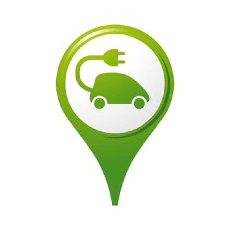 A green map pin icon featuring a stylized electric car with a charging plug, symbolizing electric vehicle charging stations or eco-friendly transportation.