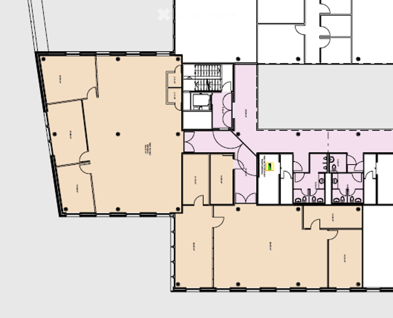 Floor plan of a multi-room building, including a large open area, several smaller rooms, and a central hallway.