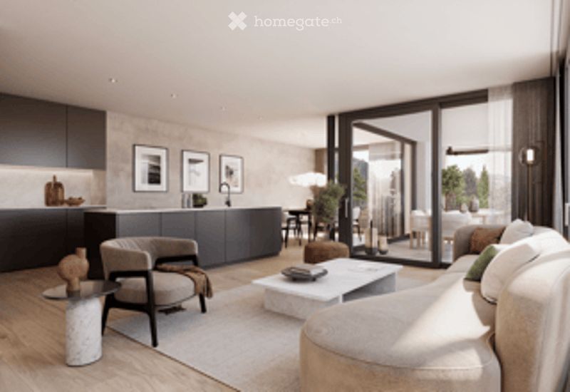 Modern open-plan living and dining area with large windows offering a view, featuring a grey sectional sofa, coffee table, dining chairs, kitchen island, pendant light, and framed artwork.