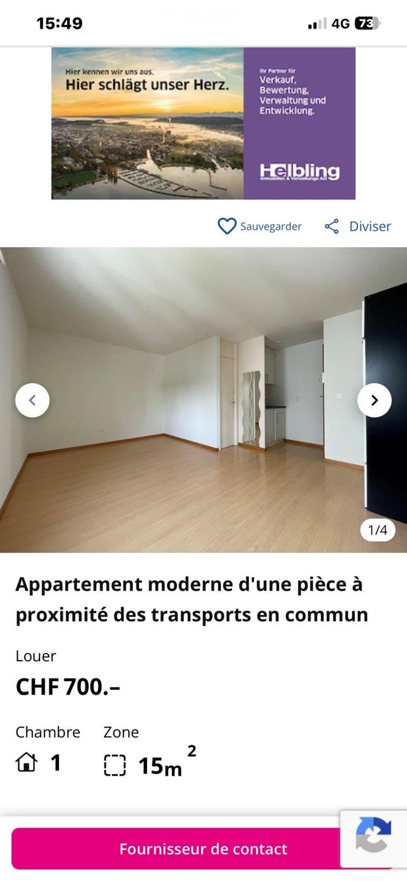 Empty room with wooden flooring and white walls, featuring a door and a small cabinet.