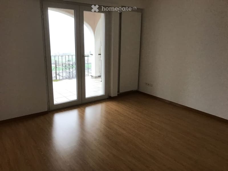 wooden floor, glass door, balcony, white walls