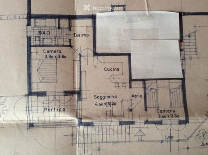 The floor plan includes a bathroom, a kitchen, a bedroom, a storage room, and a porch.