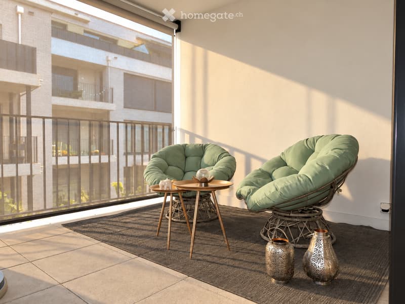 Modern balcony with two green egg-shaped chairs, a small round table, decorative vases, and a dark rug.