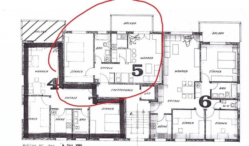 Floor plan of a multi-level residential building with labeled rooms including living areas, bedrooms, bathrooms, kitchens, and balconies.