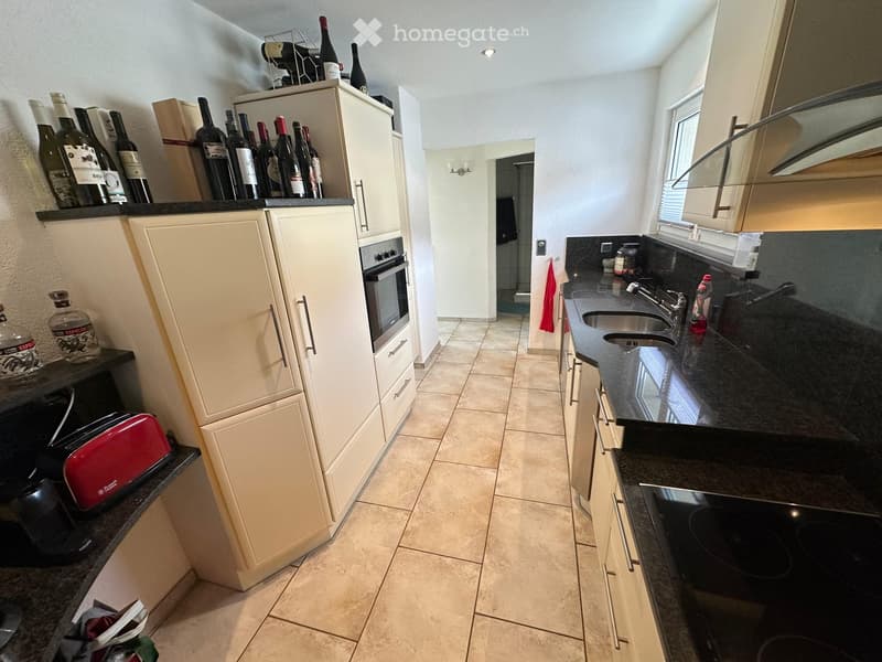 {"type": "Kitchen", "objects": ["oven", "sink", "faucet", "bottle", "fridge", "oven", "faucet", "bottle", "bottle", "bottle", "bottle", "bottle", "bottle", "bottle", "bottle", "bottle", "bottle", "bottle", "bottle", "bottle", "bottle", "bottle", "bottle",