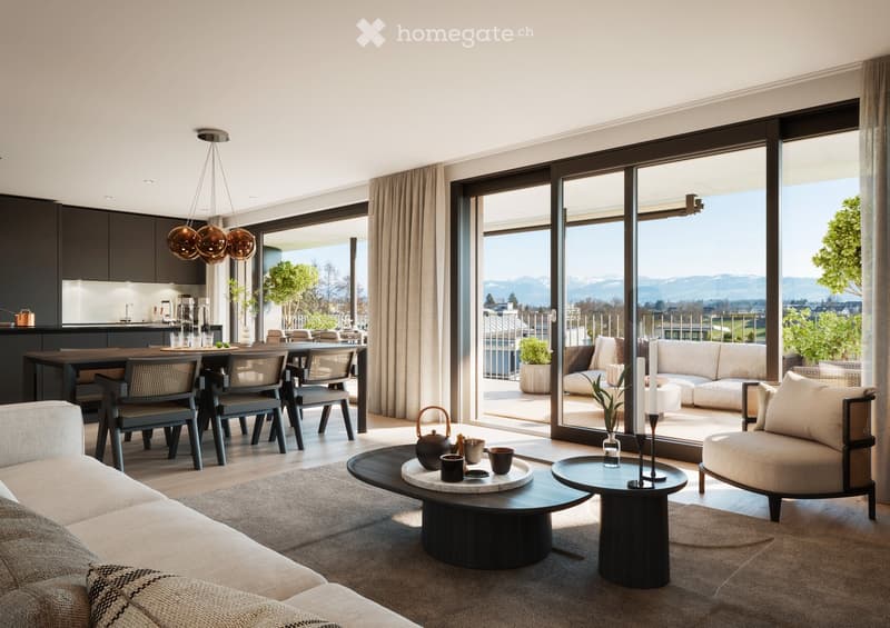 Modern open-concept living and dining area with large windows offering a scenic mountain view. Features a white sectional sofa, black coffee table, dining table with four chairs, and a sleek kitchen area with dark cabinets and pendant lighting.