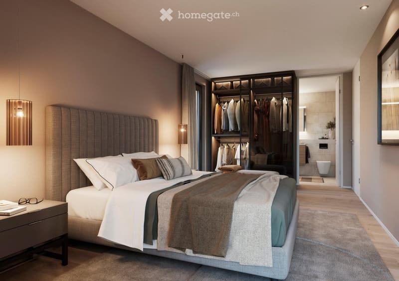 Modern bedroom with a large bed, nightstand, wardrobe, and an adjacent bathroom with a toilet.