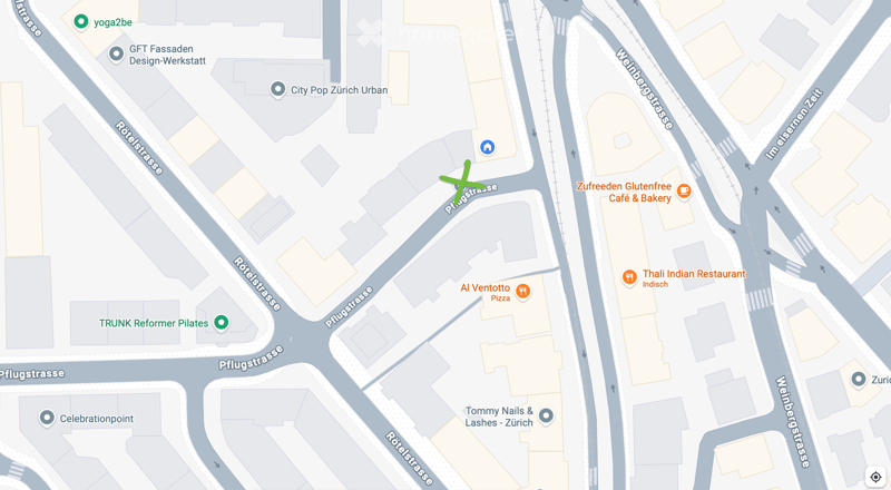 Map showing a city area with streets, buildings, and various points of interest including restaurants, cafes, and fitness studios.