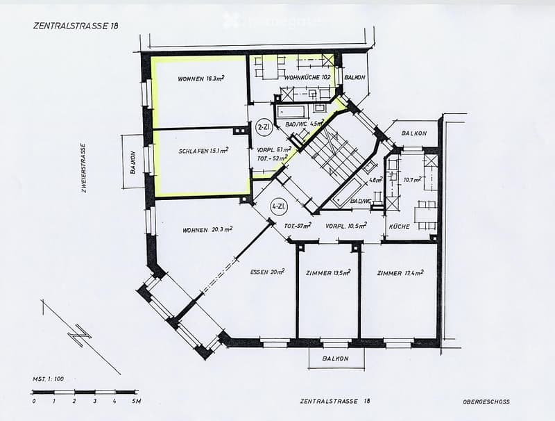 Floor plan of an upper floor showing living spaces, bedrooms, kitchen, bathrooms, and balconies.